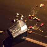 A trash can that was thrown on the Brooklyn-bound roadway